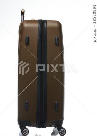 Side of closed brown suitcase 38550991