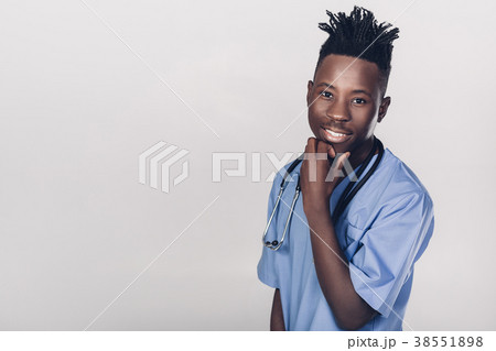 African-American doctor on a gray background African-American doctor on a gray background 38551898