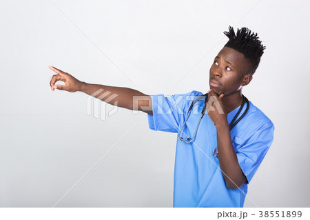 African-American doctor on a gray background African-American doctor on a gray background 38551899