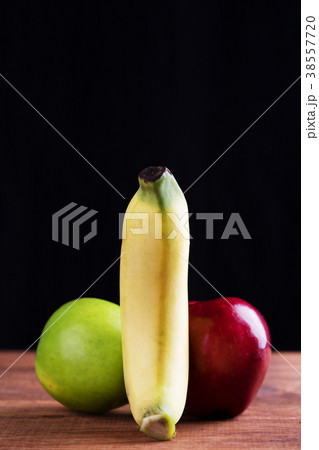 Abstract of Banana and Red apple . Abstract of Banana and Red apple . 38557720
