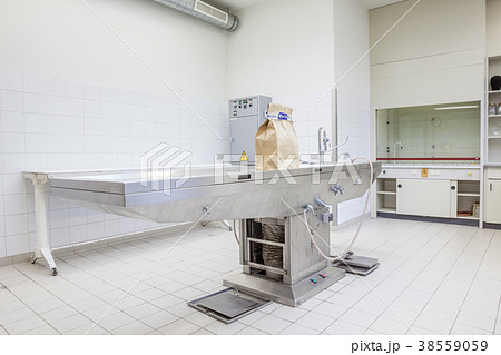 Autopsy tables in morgue 38559059