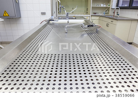 Autopsy tables in morgue Autopsy tables in morgue 38559066