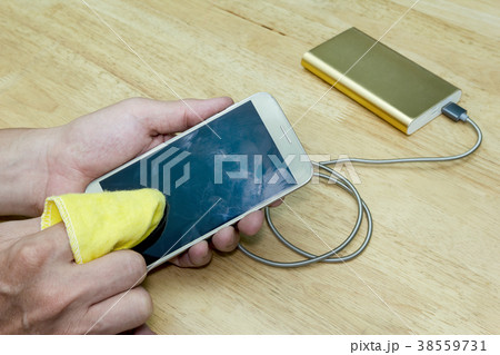 Smartphone cleaning screen with power bank Smartphone cleaning screen with power bank 38559731