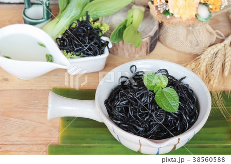 black noodles with pork and dumpling delicious black noodles with pork and dumpling delicious 38560588