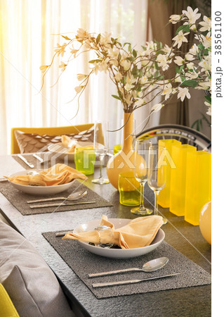 table setting for breakfast in yellow decoration 38561100