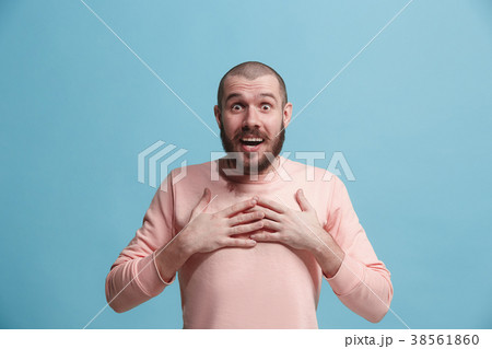 The young attractive man looking suprised isolated 38561860