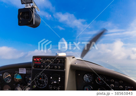 Sky and dashboard of private sport plane 38563843