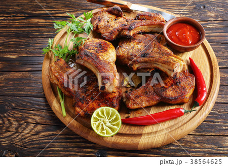 close-up of juicy grilled pork cutlets 38564625