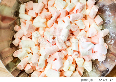 Colorful marshmallows close up in a bowl Colorful marshmallows close up in a bowl 38569137