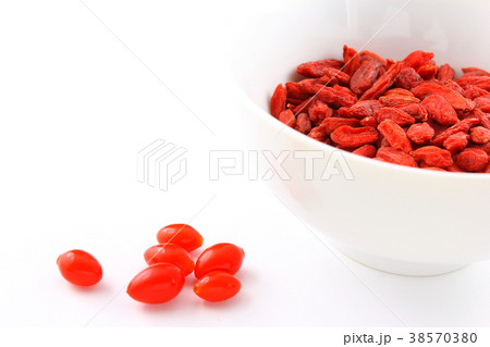 dried goji berries in a small white bowl dried goji berries in a small white bowl 38570380