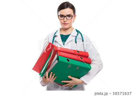 Angry young woman doctor with stethoscope holding 38571637