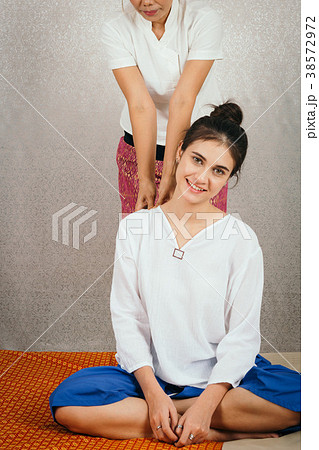 Young Girl get Thai massage for body therapy 38572972
