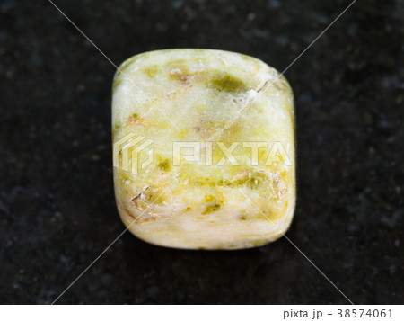 polished agate gem stone on dark background polished agate gem stone on dark background 38574061