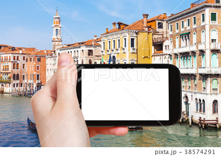 tourist photograps palaces on Canal in Venice tourist photograps palaces on Canal in Venice 38574291