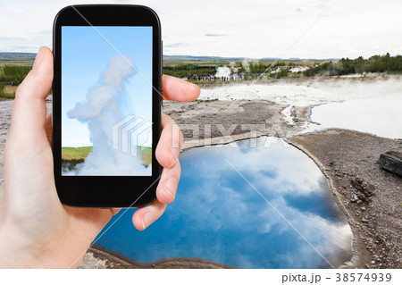 tourist photographs pool of Geisyr in Haukadalur tourist photographs pool of Geisyr in Haukadalur 38574939