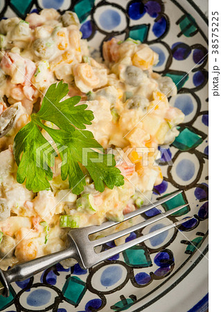 Traditional Russian vegetable salad. 38575225