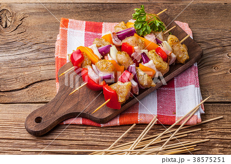 Raw beef skewers ready for grilling Raw beef skewers ready for grilling 38575251