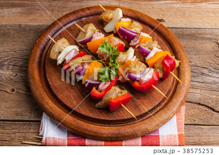 Raw beef skewers ready for grilling 38575253