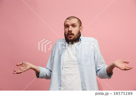 Let me think. Doubtful pensive man with thoughtful 38575289