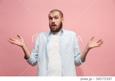 Let me think. Doubtful pensive man with thoughtful 38575397