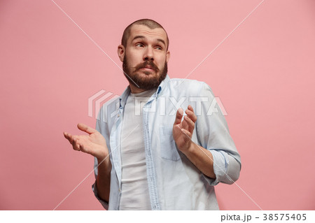 Let me think. Doubtful pensive man with thoughtful 38575405