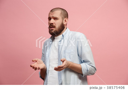 Let me think. Doubtful pensive man with thoughtful 38575406