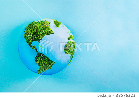 Earth model made of paper and fresh green sprouts Earth model made of paper and fresh green sprouts 38576223