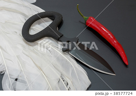 Black knife on a black background. Black knife on a black background. 38577724