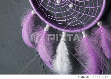 Lilac dream catcher on dark gray Lilac dream catcher on dark gray 38579947