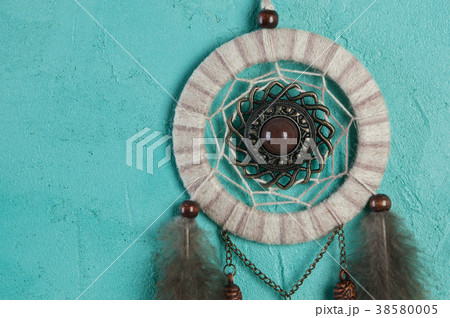 Dream catcher on aquamarine Dream catcher on aquamarine 38580005