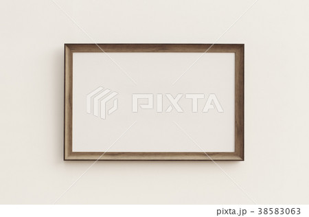 Wooden Blank Photo Frame hang on the wall. 38583063