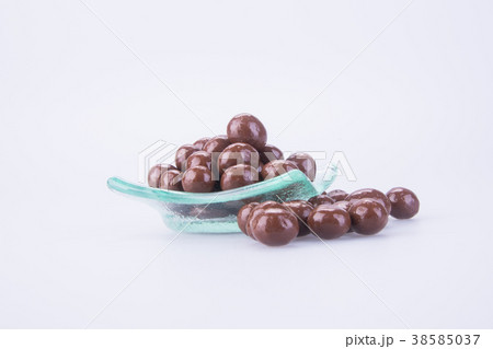 chocolate balls in bowl on a background chocolate balls in bowl on a background 38585037