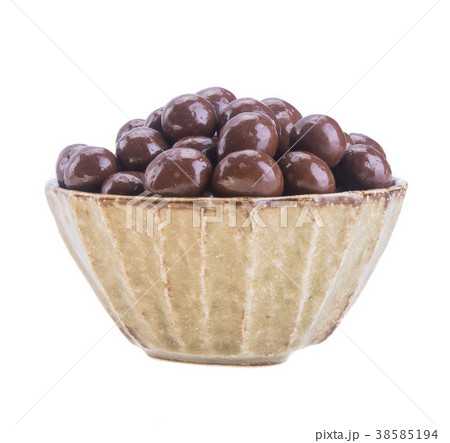 chocolate balls in bowl on a background 38585194