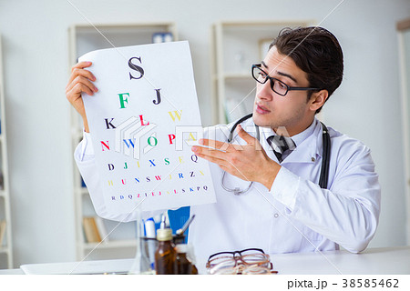Eye doctor in medical concept Eye doctor in medical concept 38585462