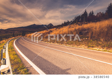 Empty road in high mountains Empty road in high mountains 38586540