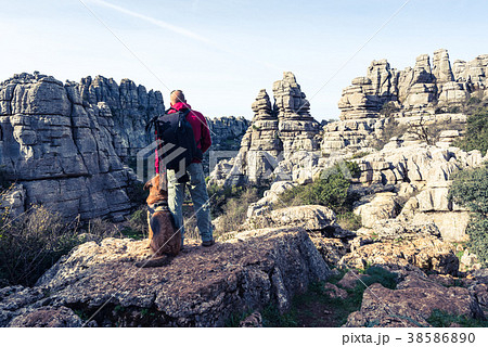 Hikker with german shepherd dog in Torcal,Spain Hikker with german shepherd dog in Torcal,Spain 38586890