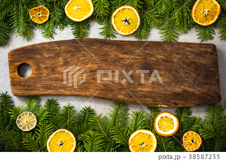 Wooden board and Christmas fir Wooden board and Christmas fir 38587255
