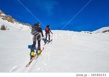 Two girls in the woods with mountaineering  38589243