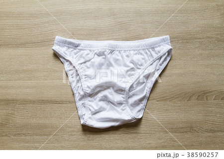 Men white underwear on wooden background 38590257