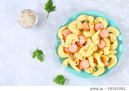Pasta Cavatappi or Cellentani with sausages Pasta Cavatappi or Cellentani with sausages 38591062