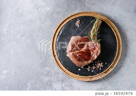 Grilled tomahawk steak 38592979