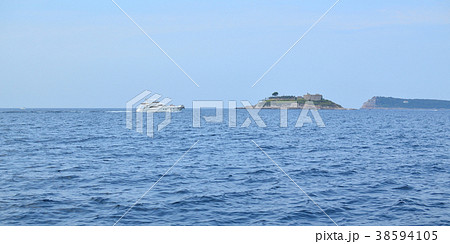 Tourist boat and island Tourist boat and island 38594105