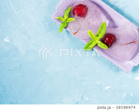 Summer background ice hearts cherries 38596974