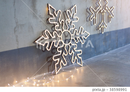 Wooden christmas decoration for the walls. Glowing Wooden christmas decoration for the walls. Glowing 38598991