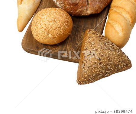 Composition with bread and rolls on cutting board Composition with bread and rolls on cutting board 38599474