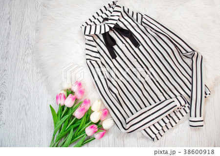 White blouse with black stripes on a white fur White blouse with black stripes on a white fur 38600918