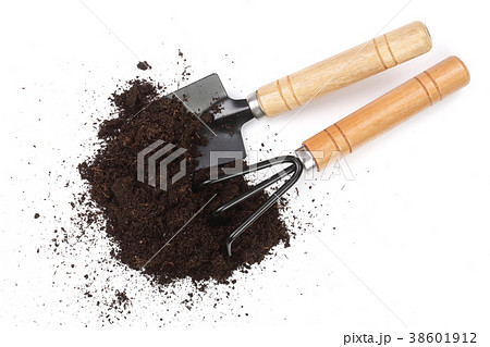 garden tools in soil isolated on white background garden tools in soil isolated on white background 38601912