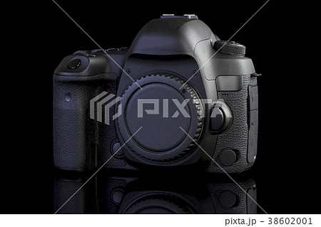 DSLR camera on black glass background DSLR camera on black glass background 38602001