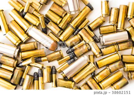 Bullet shells on a white background Bullet shells on a white background 38602151
