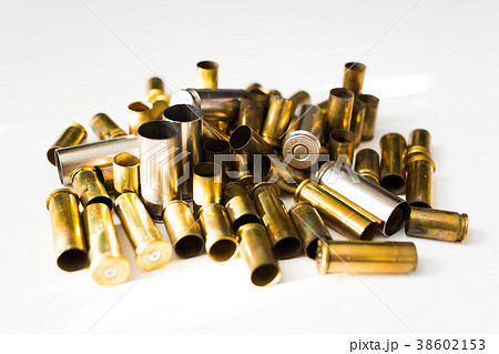 Bullet shells on a white background Bullet shells on a white background 38602153